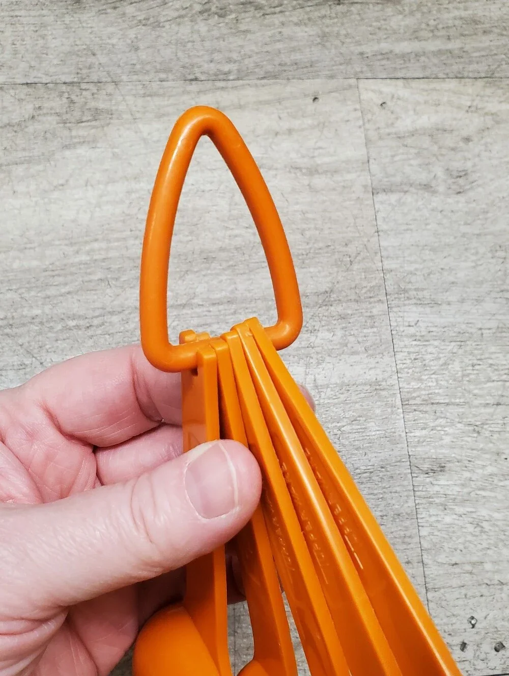 Vintage Tupperware orange measuring spoons
